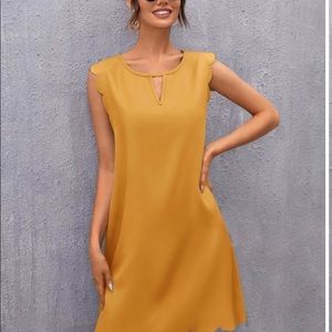 New Keyhole trim scalloped hem. Gorgeous color yellow.